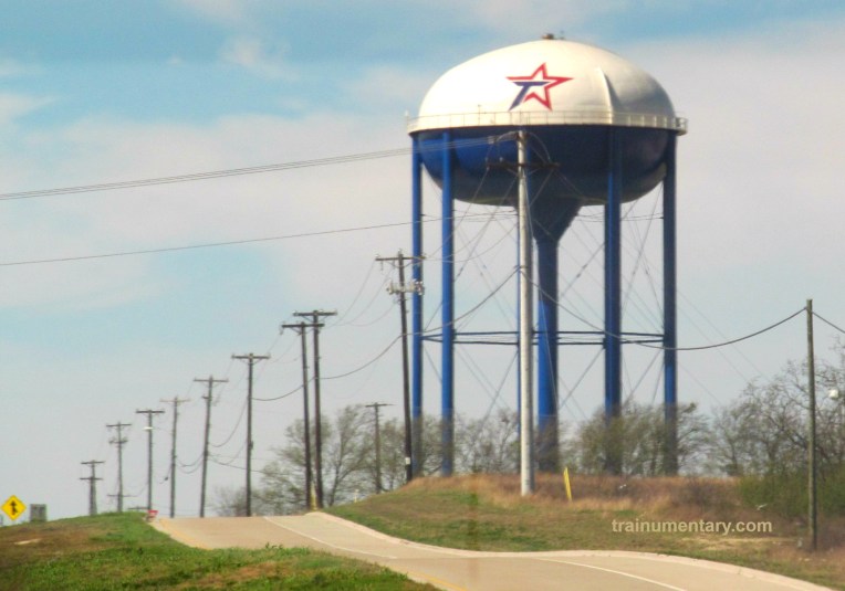 Cleburne TX near Water Tower Leads March trainumentary CROPPED
